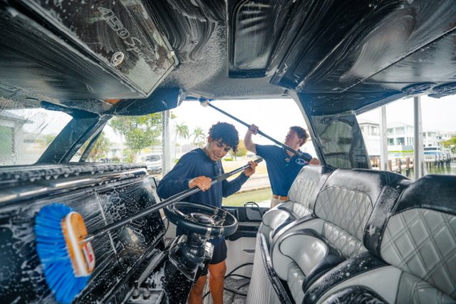 Deep cleaning a yacht helm and seats in Naples, Florida